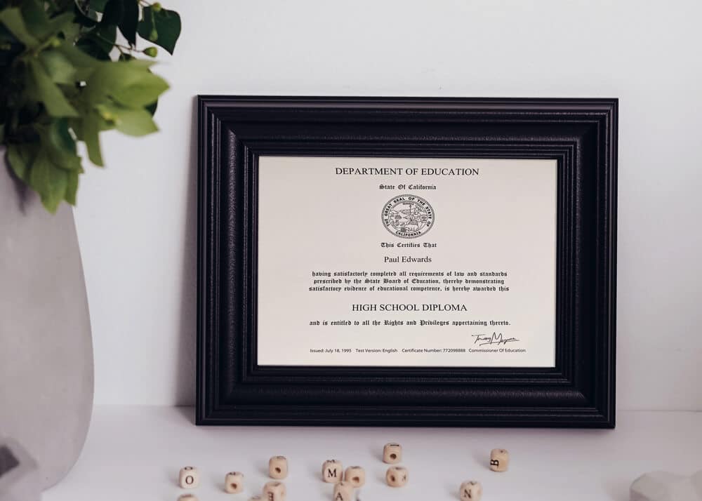 ValidGrad's framed sample of a fake high school diploma with a signature
